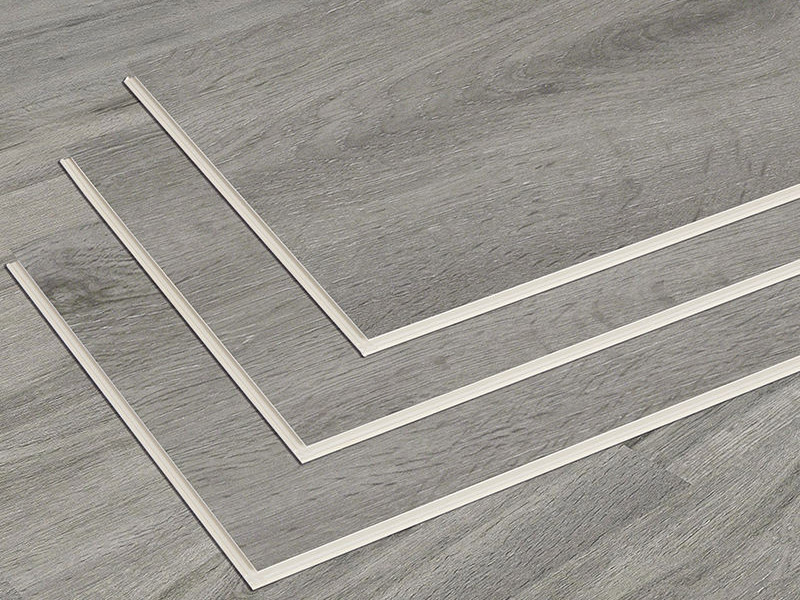 Waterproof stone-plastic composite flooring