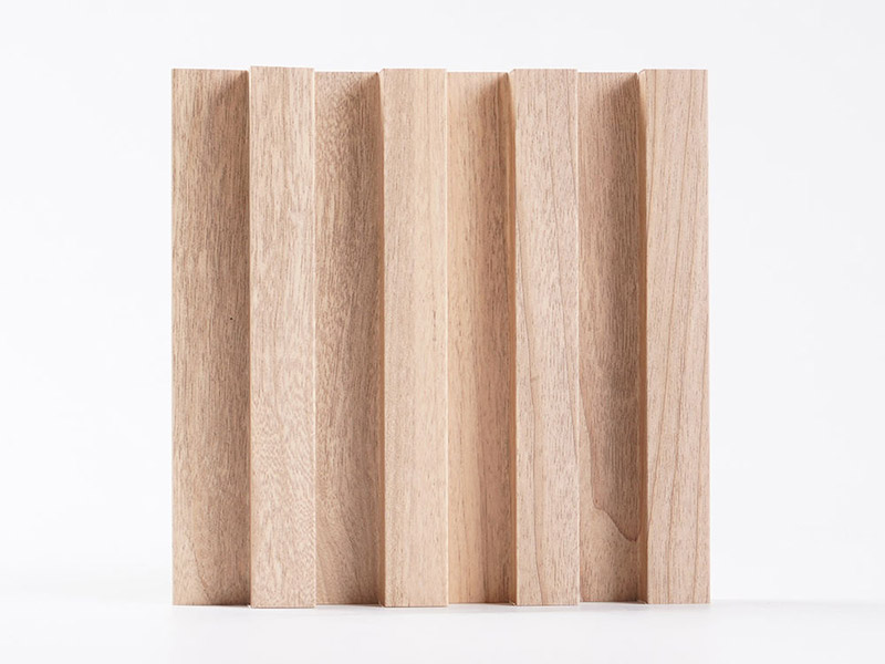 Corrugated sound-absorbing grille